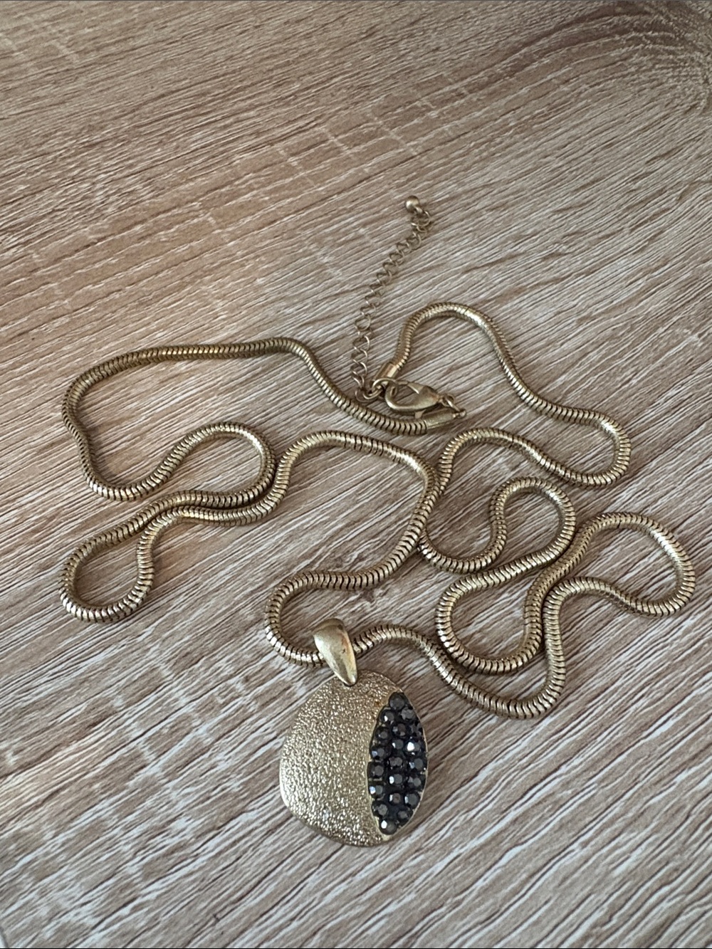 Gold Tone Snake Chain Claw Catch Pendant Gold and Grey Rhinestone Necklace